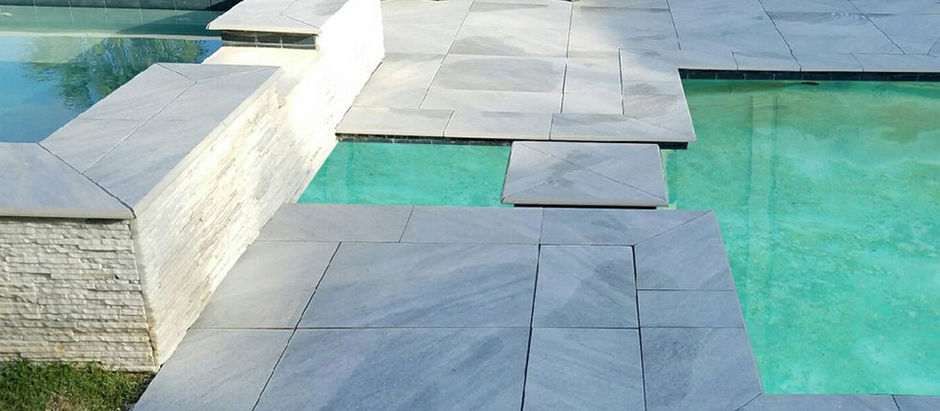 How Porcelain Pavers Handle Water Better Than Traditional Outdoor Materials