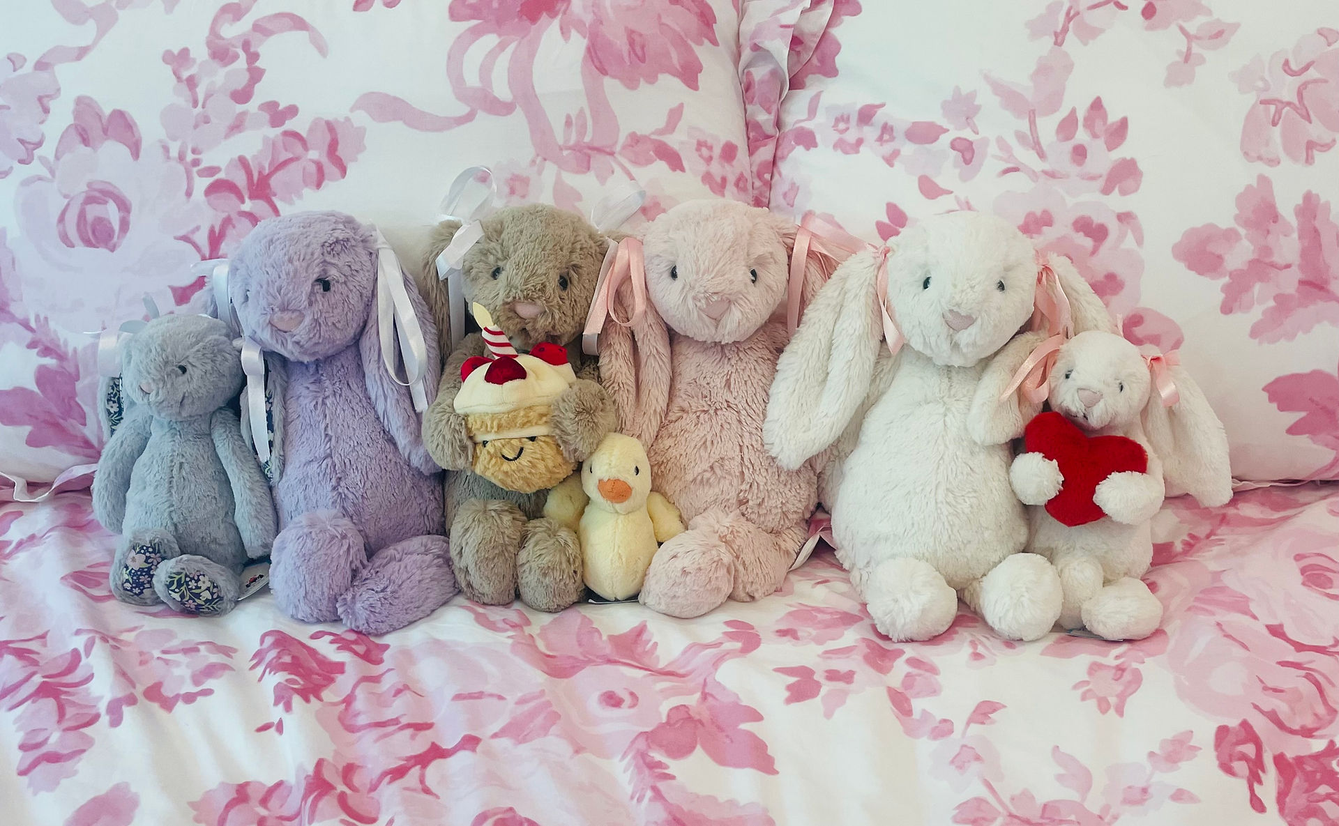 Jellycats on Loveshack Fancy Duvet.