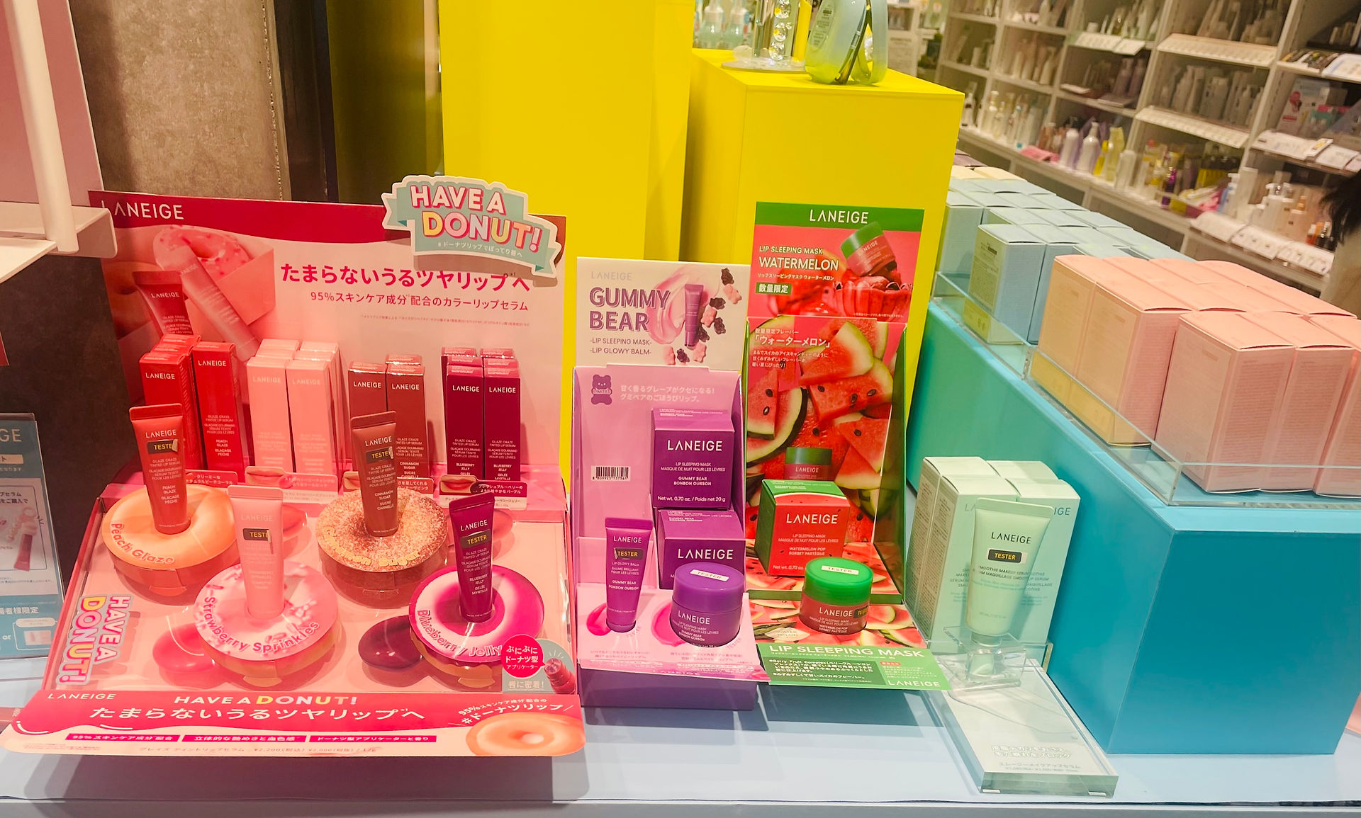 Laneige display with Glaze Craze Tinted lip balms, Lip Glowy Balms, and Water Melon lip masks at Loft Ginza. 