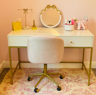 Loveshack Fancy vanity with bows, Kendra Scott, and aesthetic pink target basket.