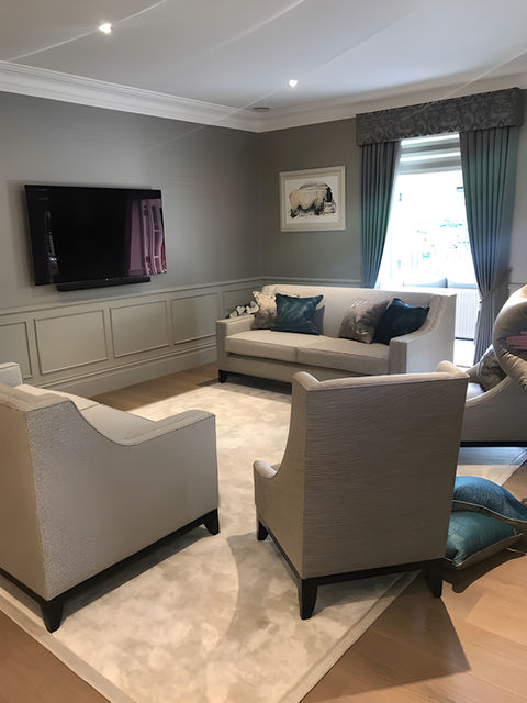 Suite of arm chairs and sofas in upholstered cream beige grey fabrics