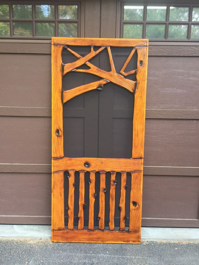 Thumbnail: Rustic Screen Door with Pine Trees
