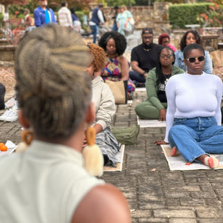 Mi'Lisa Idora giving a sound bath at Becoming Love Fest.