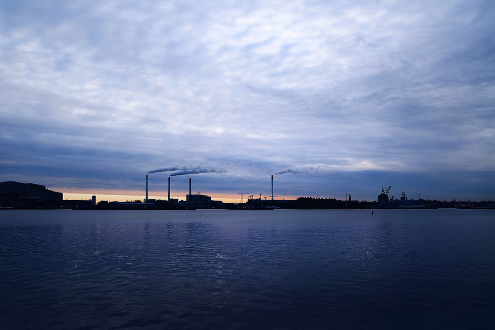 View of HOFOR's Amagerværket BIO4 Plant and harbor at dawn. Copenhagen, Denmark.jpg