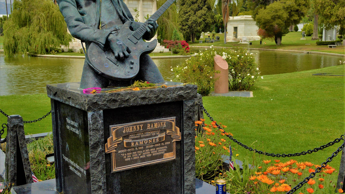 Historic cemetery known for outdoor movie nights and celebrity graves.