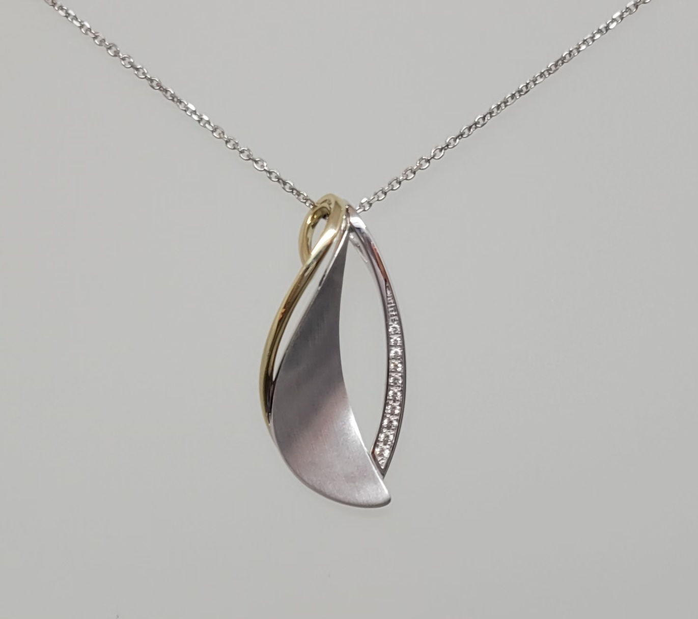 Pendant white sapphires in sterling silver and yellow gold plate by Breuning