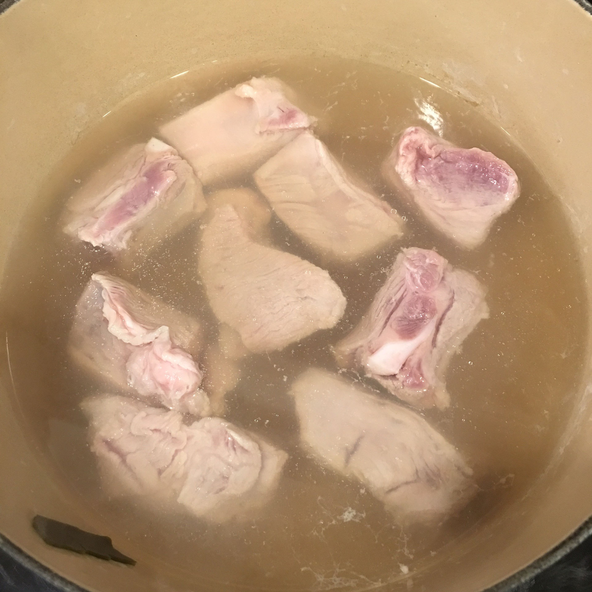Place pork in stock