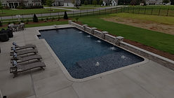 custom vinyl pool with tanning ledges and waterfall overflows in senoia georgia