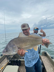 Man on guided fishing trip at Fish Ohio Outfitters holding a fish