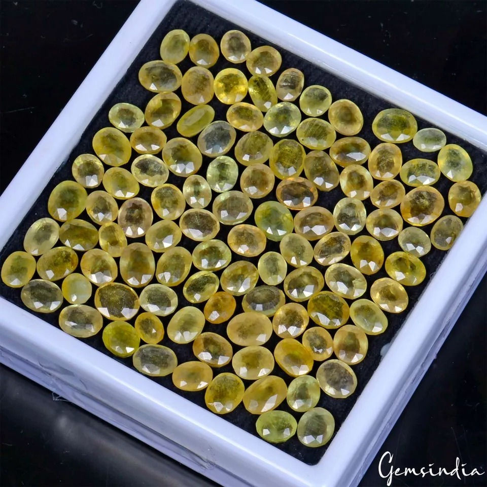 サムネイル： 250 Ct/100 Pc Natural Untreated Ceylon Yellow Sapphire (Pukhraj) 5-8mm Oval Gems