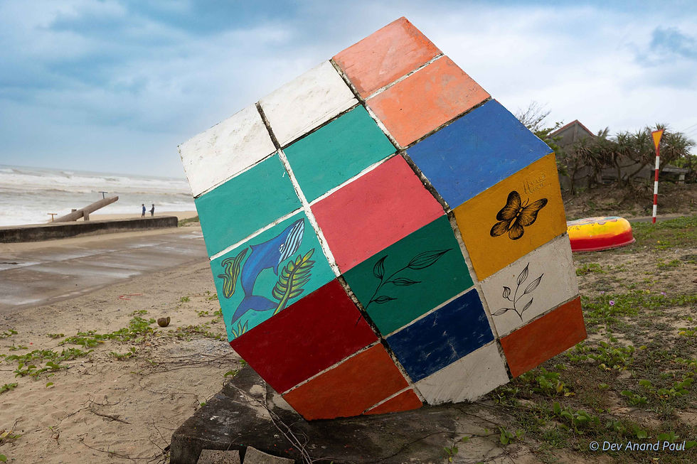 A cube mural on the beach