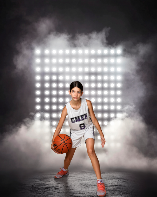 Capturing the passion and determination of a young basketball player through a professional sports portrait session.