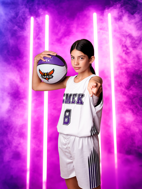 Capturing the passion and determination of a young basketball player through a professional sports portrait session.