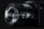 Sony RX10 camera with Zeiss lens shown in an exploded cutaway on a black background, with labels Sony, Zeiss, RX10, and AF/MF.