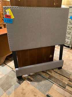 GRAY TWIN UPHOLSTERED BED W/ RAILS