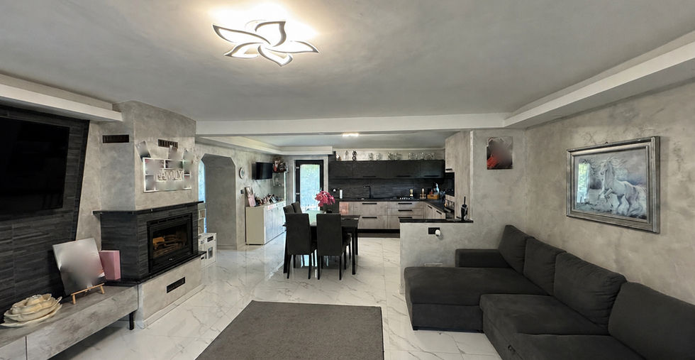 Zona giorno con cucina a vista