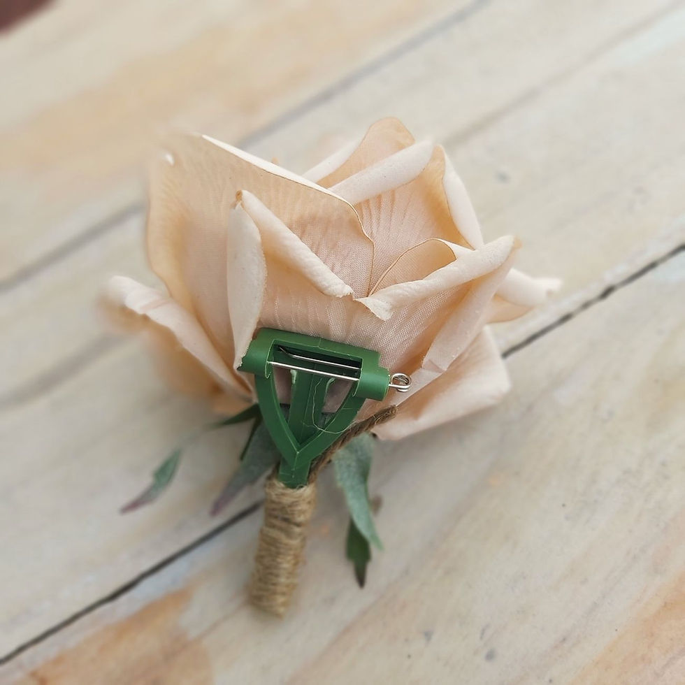 Classic Rose latte buttonhole with artificial rose and greenery for groom or groomsmen