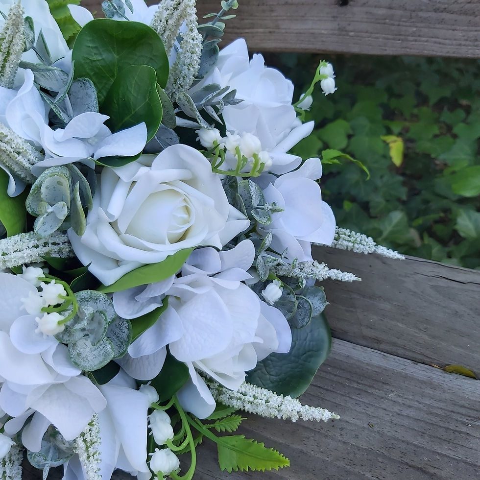 Artificial white roses and Lily of the Valley wedding bouquet