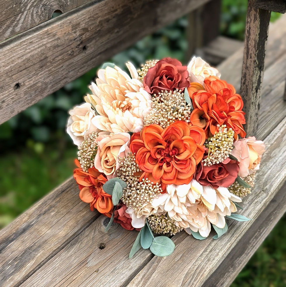Thumbnail: Eco Amber eco friendly faux bridal bouquet featuring amber, cream and caramel recycled flowers.