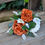 Thumbnail: Faux Autumn Harvest flower girl posy in burnt orange and cream