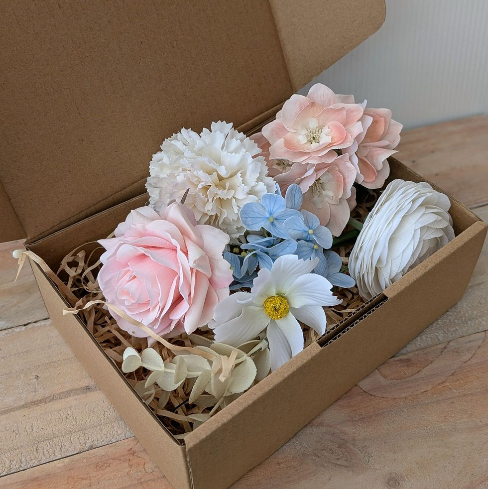 Artificial flower sample box with pastel roses and hydrangeas