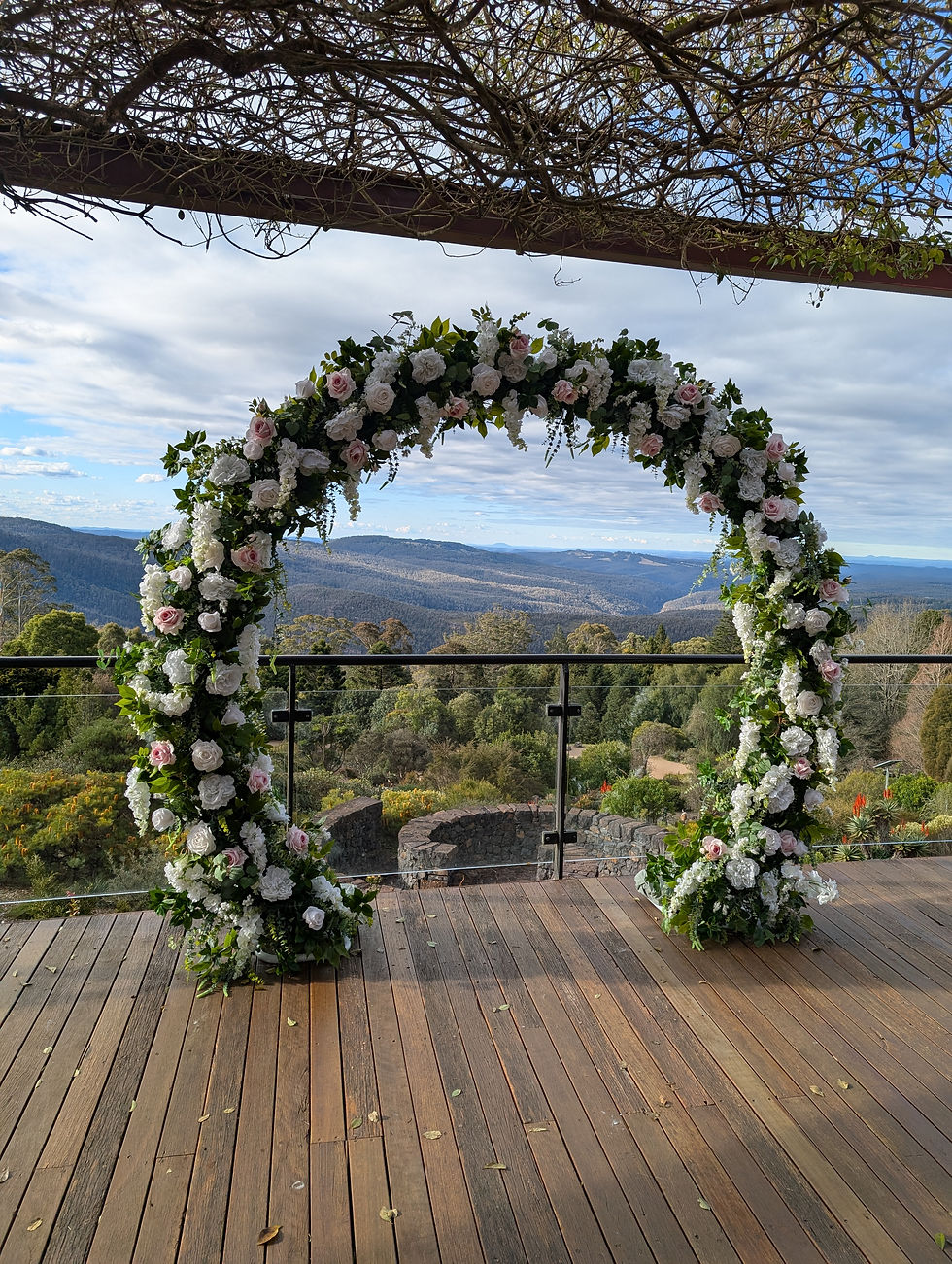 Circle floral arch arbour with white and pink flowers included