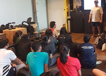 Close-up of fitness equipment arranged neatly in a gym, highlighting tools used by Coach Paul Kuck