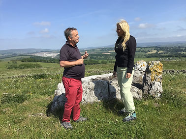 Ian and visitor at Five Wells chambered tomb