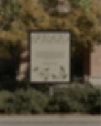 Thumbnail: A high-fidelity free urban poster mockup positioned on a sidewalk with a backdrop of golden autumn leaves and a brick buildin
