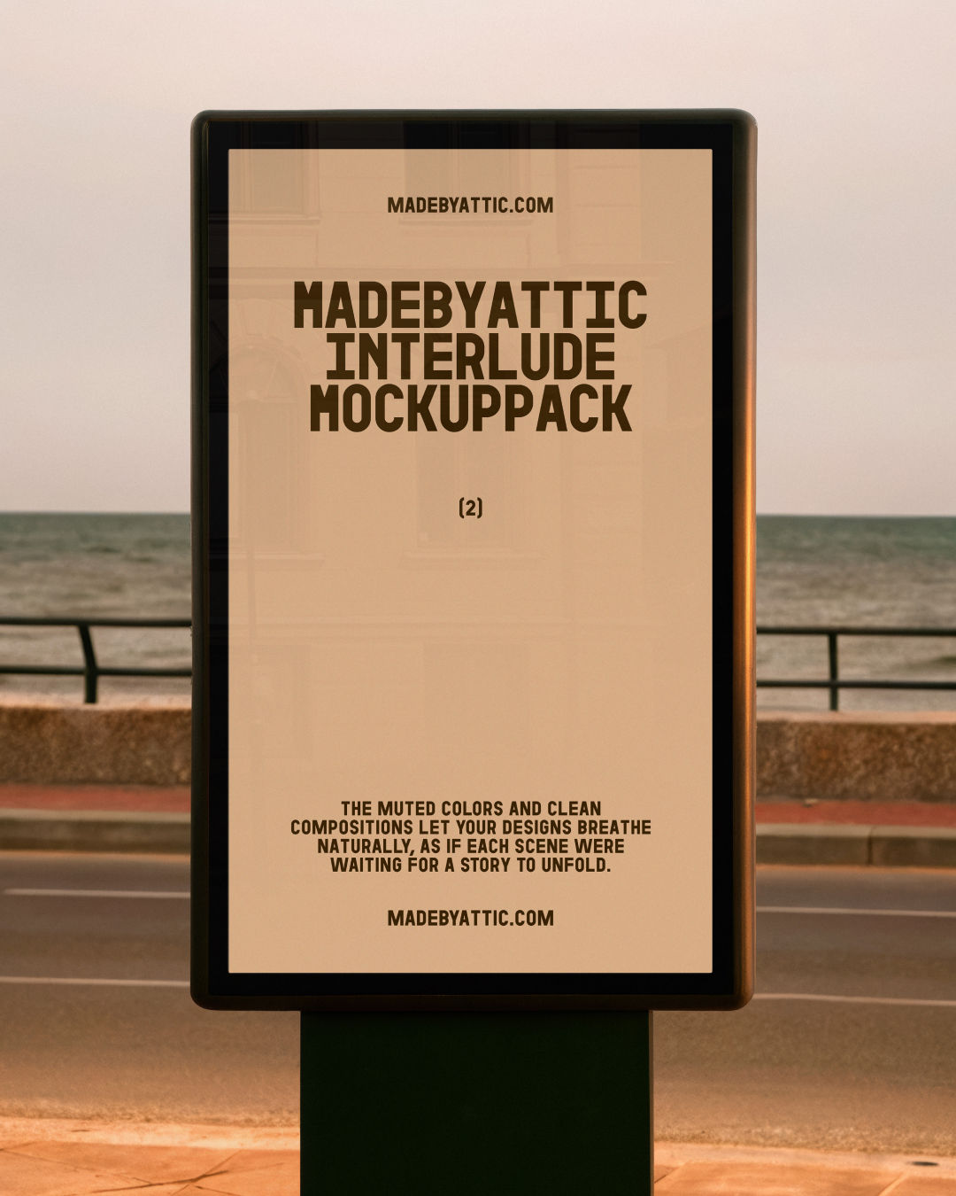 A high-fidelity citylight mockup on a black frame standing on a coastal promenade with the sea and a sunset sky in the backgr