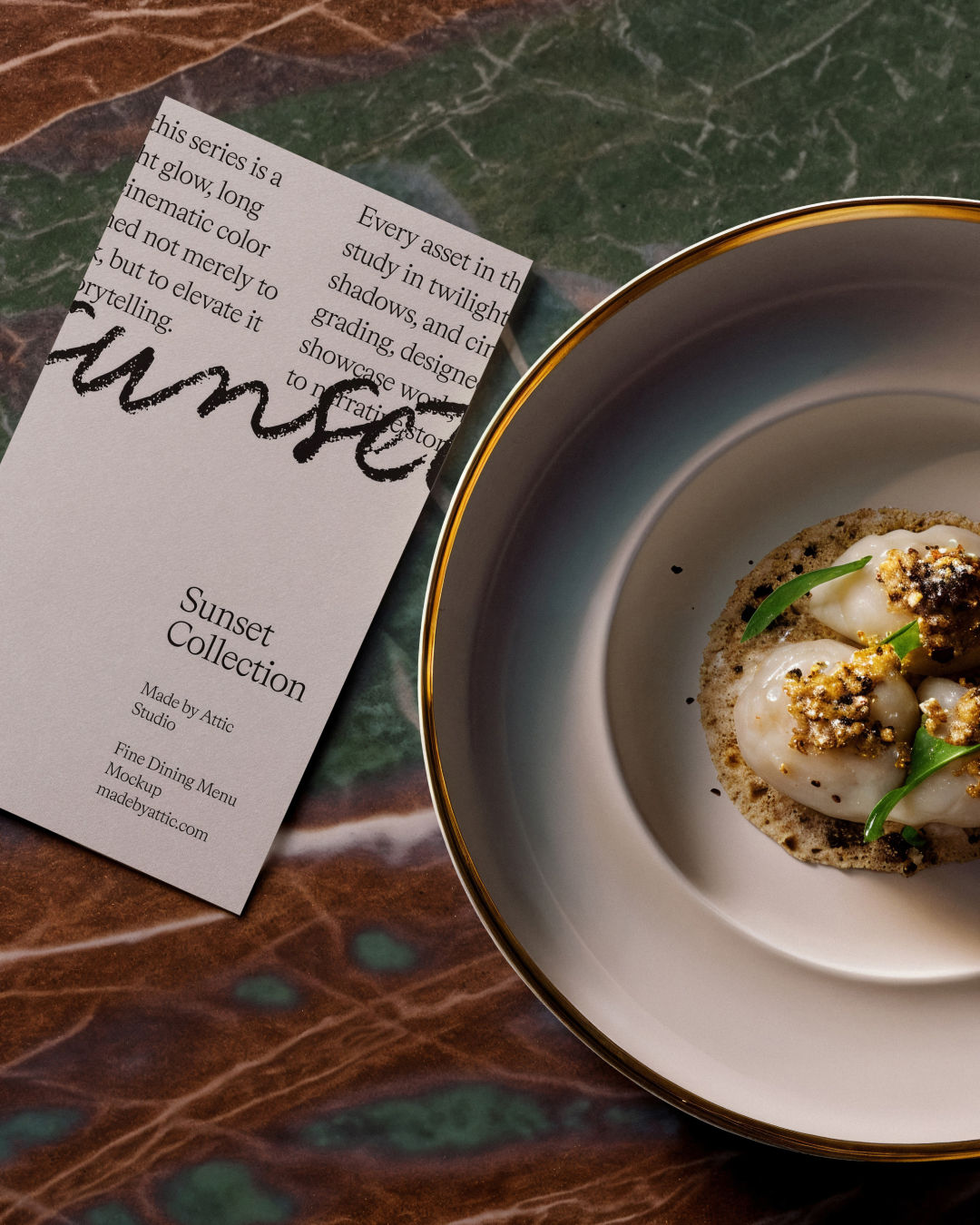 Vertical blank menu card lying on dark green marble next to a gourmet dish on a gold-rimmed plate.