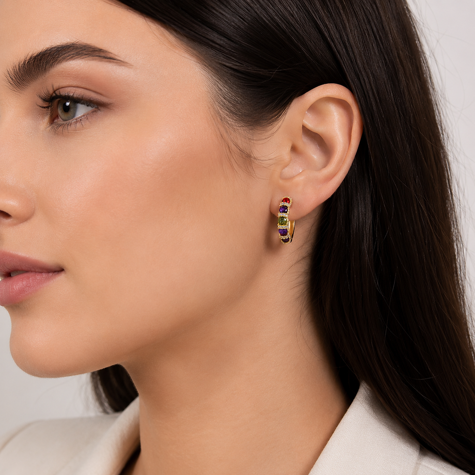 Thumbnail: Young European woman wearing 14K Gold Colour Rainbow Crystal Hoop Earrings with Premium Cubic Zirconia.