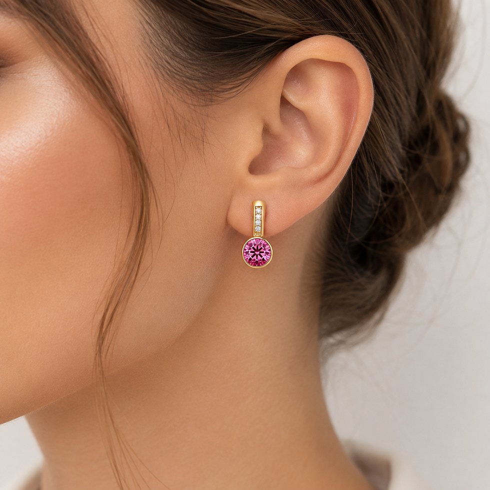 Thumbnail: Gold plated pink crystal drop earring worn on the ear