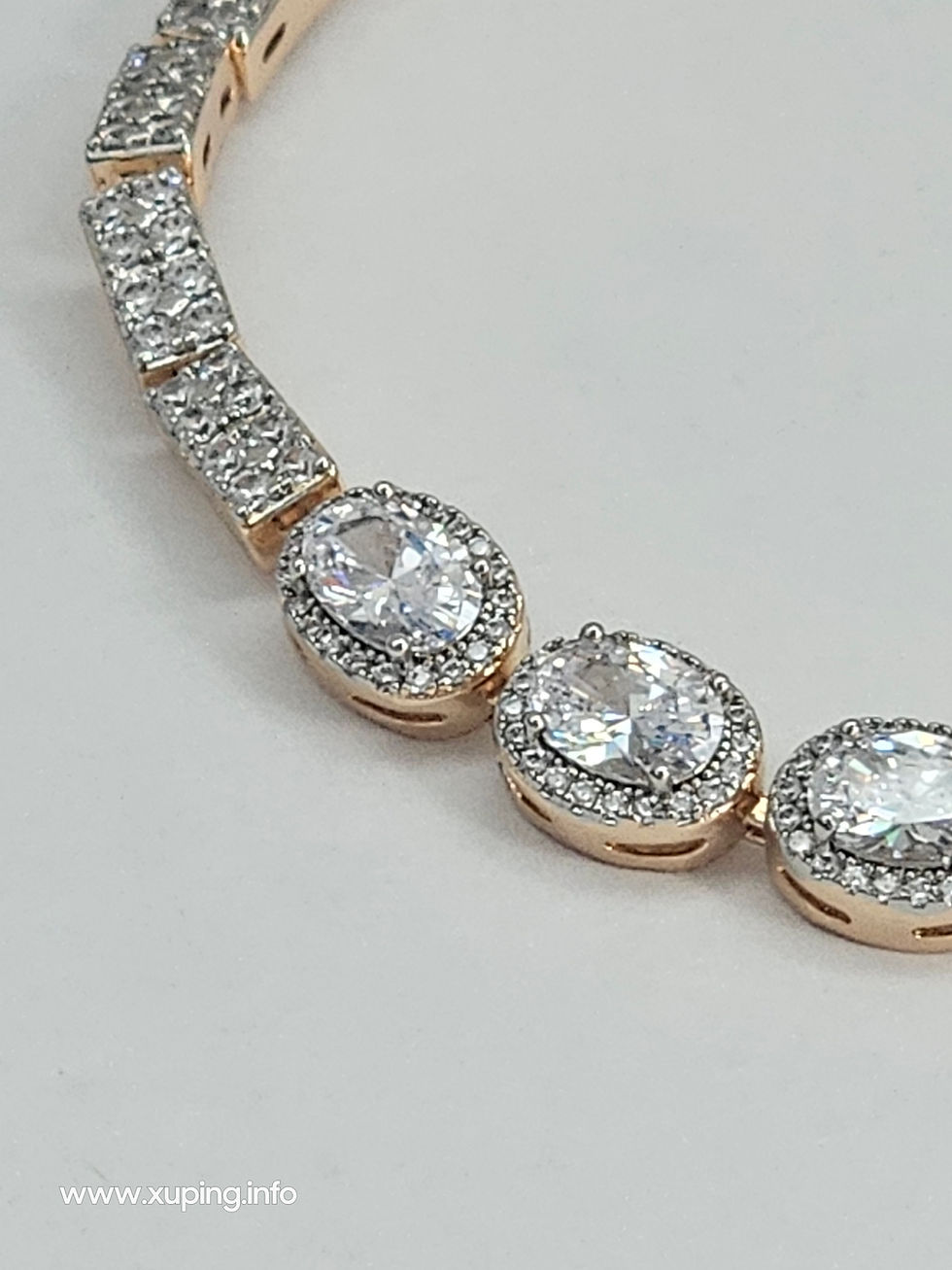 Thumbnail: Close-up of 18K gold colour bracelet with round cubic zirconia stones