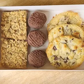 Flapjacks, chocolate macaroons, and cookies in a box