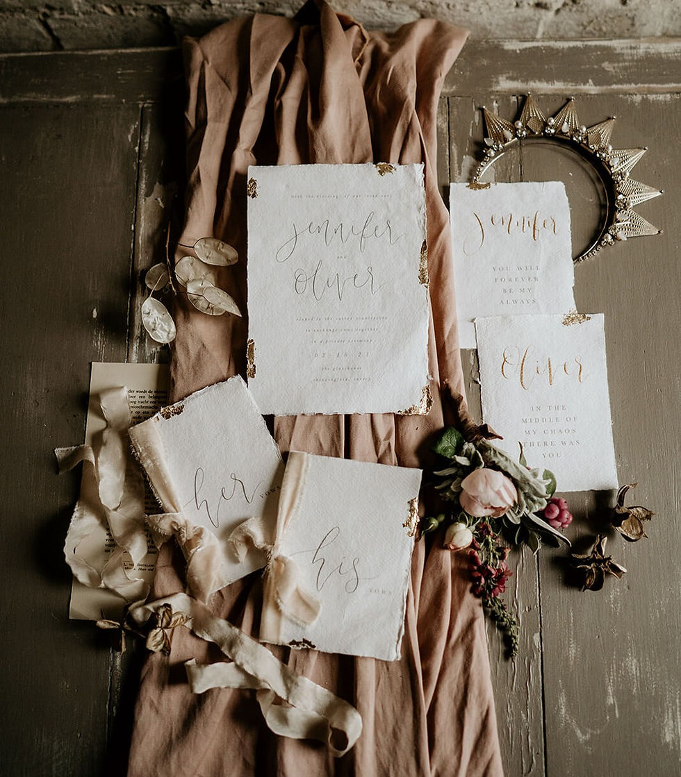 Wedding stationery with gold modern calligraphy, deckle edges and gold leaf