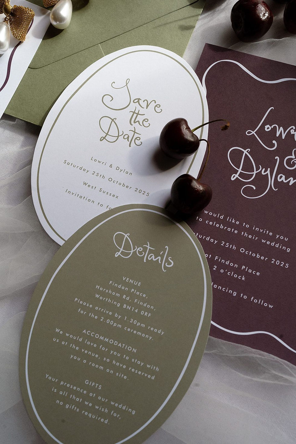 An oval save the date with an olive green whimsy font and olive green envelope