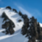 Skiing a steep chute on the Antarctic Peninsula.
