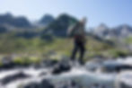 Crossing a creek on the Bailey Range Traverse in Olympic National Park.