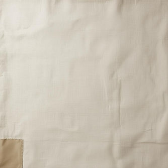 A square, full-bleed fabric background designed for a book page. The entire image is a sof