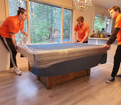 Corvallis moving company preparing large item to be moved