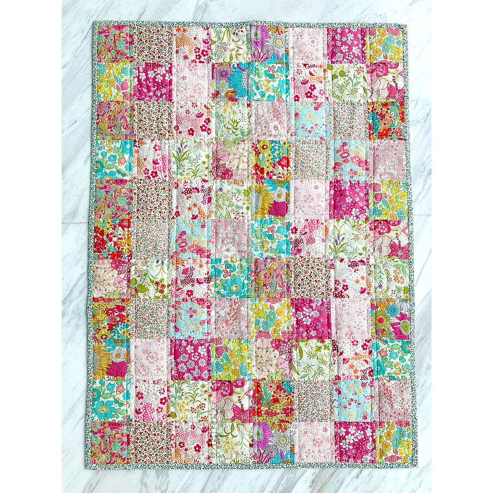 Thumbnail: Baby's Crib Patchwork Quilt Sewing Pattern made in Liberty London small ditsy fabrics