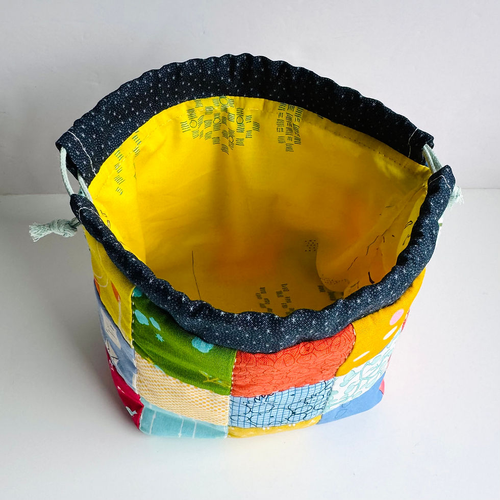 Thumbnail: Drawstring Bag Patchwork Sewing Pattern by Tikki London, PDF download