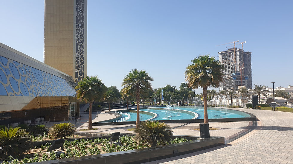 Entrance to Dubai Frame with Palms and Fountains: Experience the grand entrance to the Dubai Frame, adorned with palm trees and beautiful fountains, setting the stage for a memorable visit to this architectural marvel.