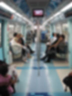 Inside a Dubai Metro Carriage in Motion: Experience the clean, modern, and air-conditioned interior of the Dubai Metro, offering a comfortable ride as you travel across the city’s key destinations.