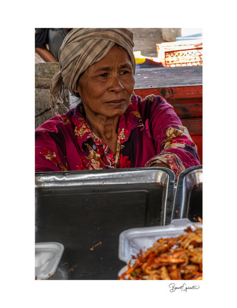 Seller at the crab market in Kep, Cambodia