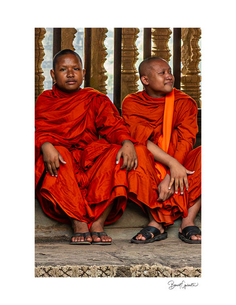 Monks in the temple of Angkor Wat near Siem Reap in Cambodia