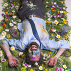 DALL·E 2022-11-10 08.20.33 - An impressionist flowered and happy man dying.png