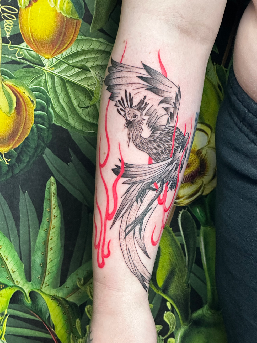 Pheonix tattoo with red flames 5