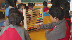 Child with abacus 1